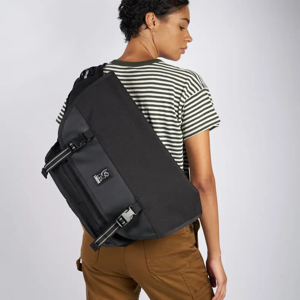 Mini Metro Black. A small-scale version of our original, iconic messenger bag. Water-resistant and durable, the Mini Metro 20.5L Messenger is ready to carry your gear comfortably through your day.