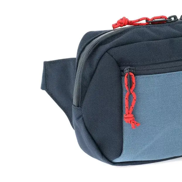 Ziptop Waistpack Navy Tritone. Super useful on-the-go waistpack, aka fanny pack, which doubles as a sling for your phone, keys, wallet and more. Get where you're going in crazy style.