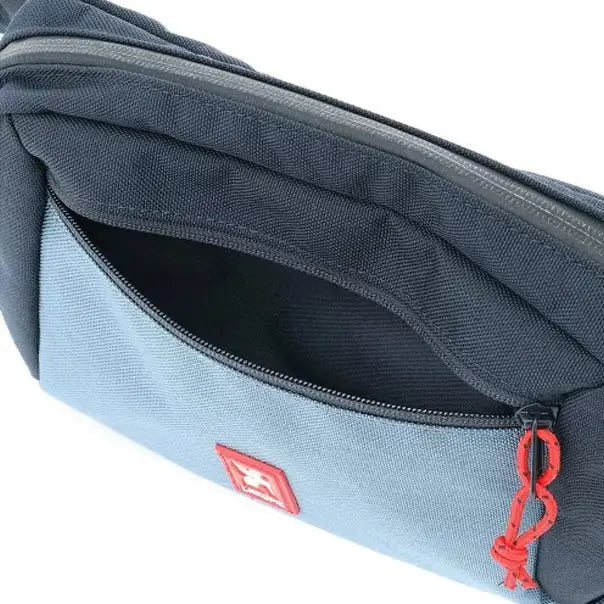 Ziptop Waistpack Navy Tritone. Super useful on-the-go waistpack, aka fanny pack, which doubles as a sling for your phone, keys, wallet and more. Get where you're going in crazy style.