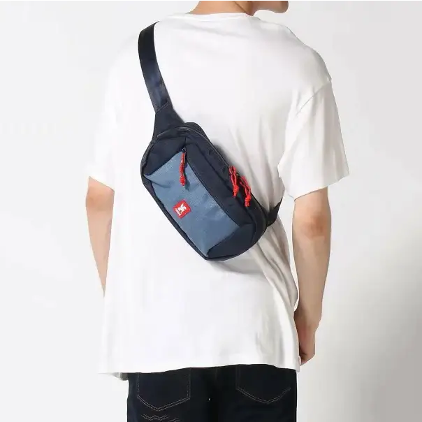 Ziptop Waistpack Navy Tritone. Super useful on-the-go waistpack, aka fanny pack, which doubles as a sling for your phone, keys, wallet and more. Get where you're going in crazy style.